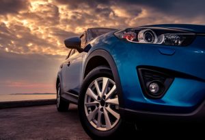 stock photo blue suv car sport modern design parked concrete road sea 1